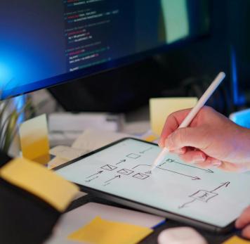 Image illustrant un homme travaillant sur une tablette